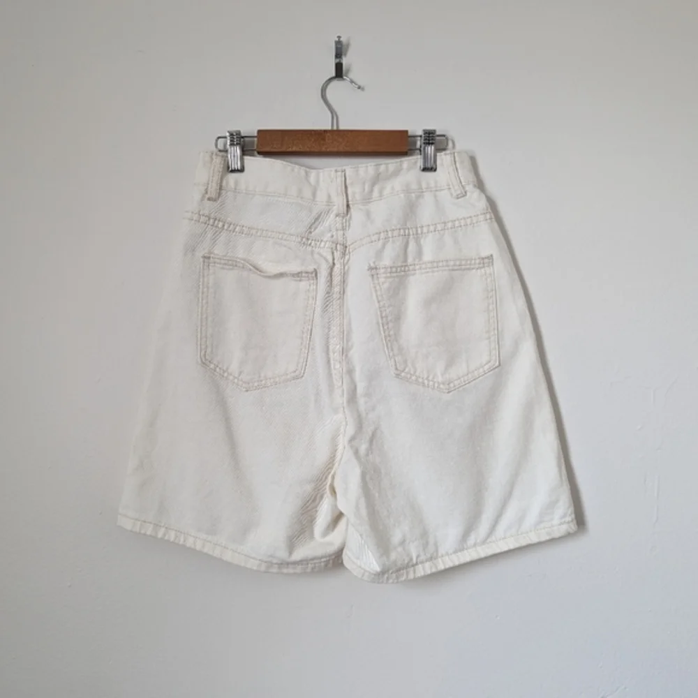 NWT‎ 12th Tribe bone off white ivory asymmetric crisscross Dylan denim shorts